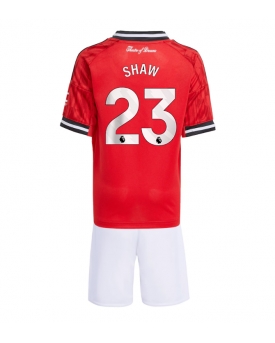 Billige Fotballdrakt Manchester United Luke Shaw #23 Replika Hjemmedraktsett Barn 2025-26 Kortermet (med bukser)